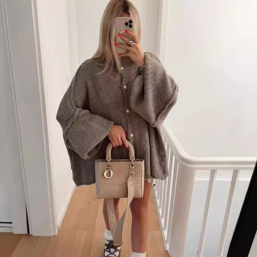 Zoë | Oversized vest met gouden knopen